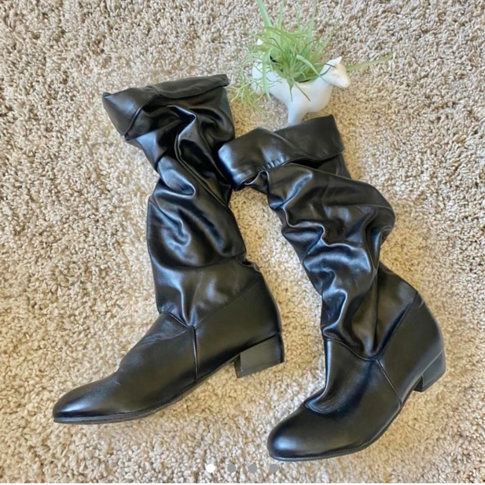 Brand new never worn faux leather shiny ruffled tall black boots. Simple